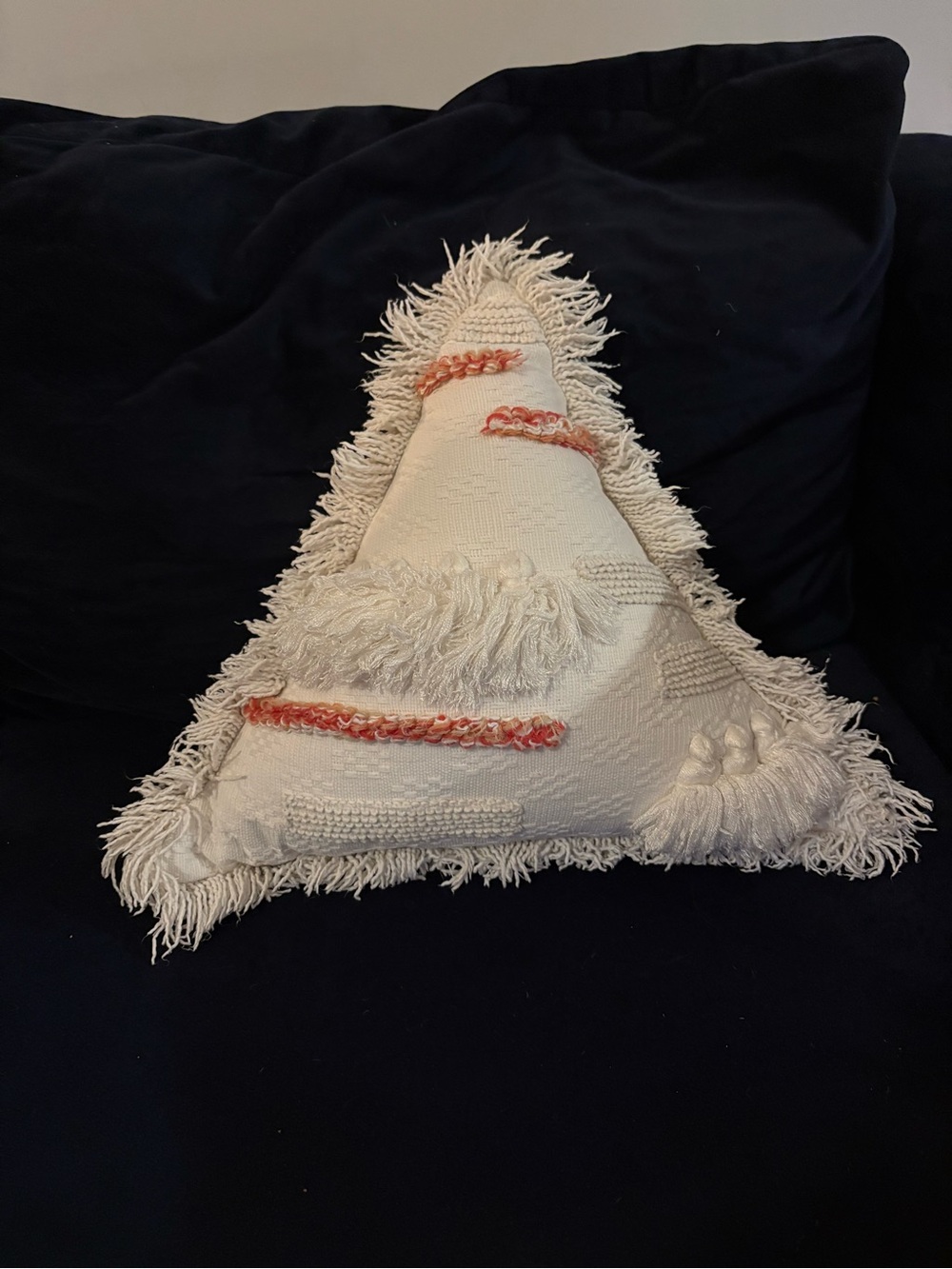 Boho Cream Textured Triangle Throw Pillow with Coral Accents